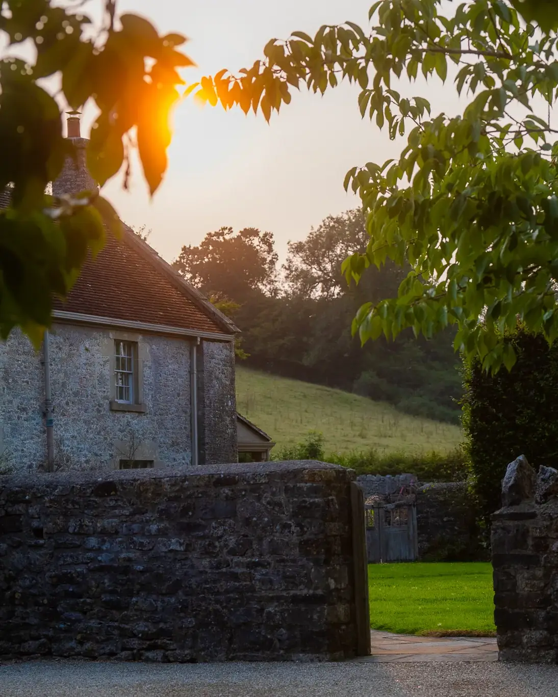Stone farmhouse and gate at Everards Farm, Somerset